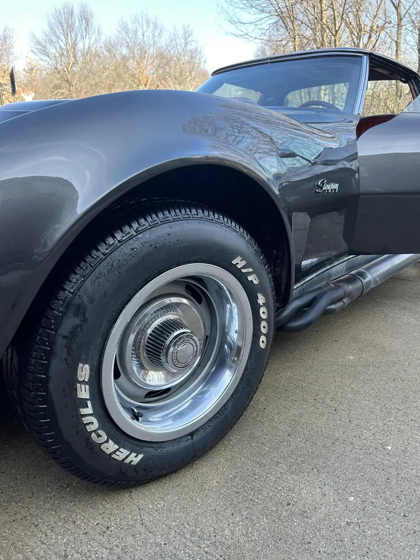 Salt-covered winter wheel and tire ready for iron decontamination and careful cleaning