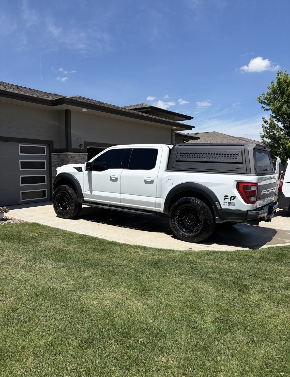 White Ford Raptor truck after a full exterior detail