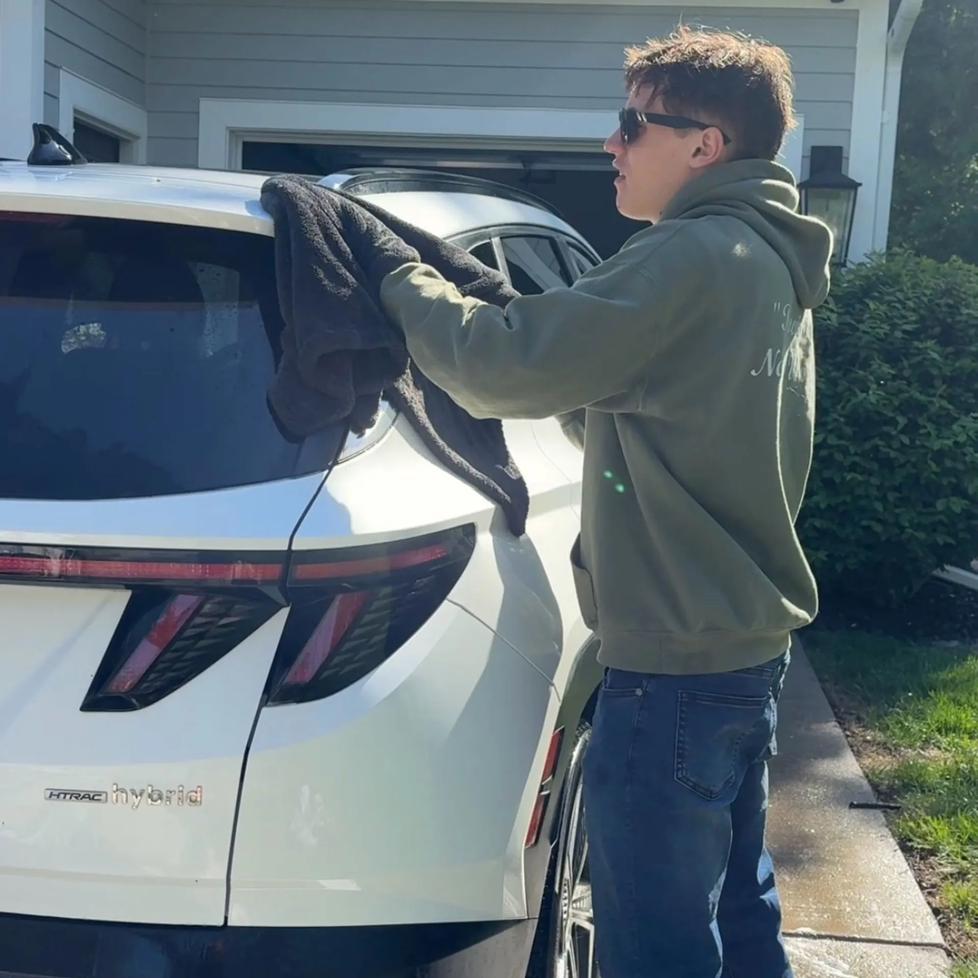 Safe microfiber drying after a spring wash before inspecting clean paint for hail dents and water spots