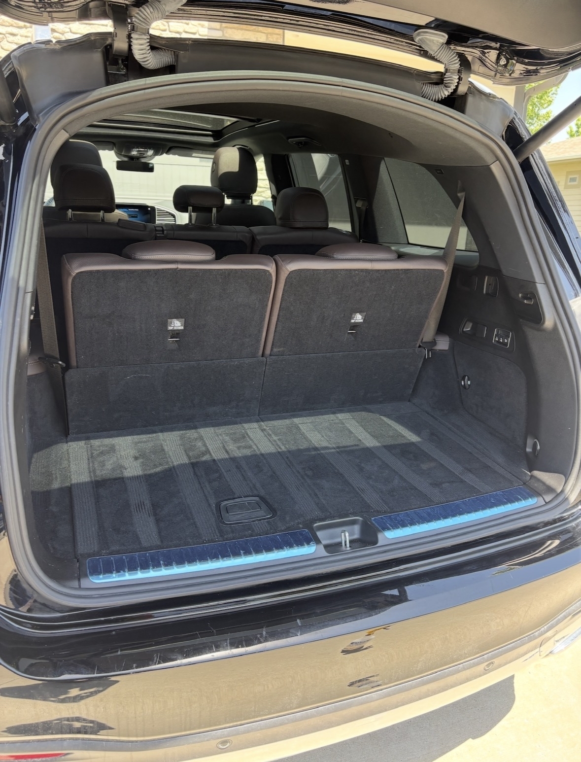 Mercedes SUV cargo area vacuumed with fresh carpet lines